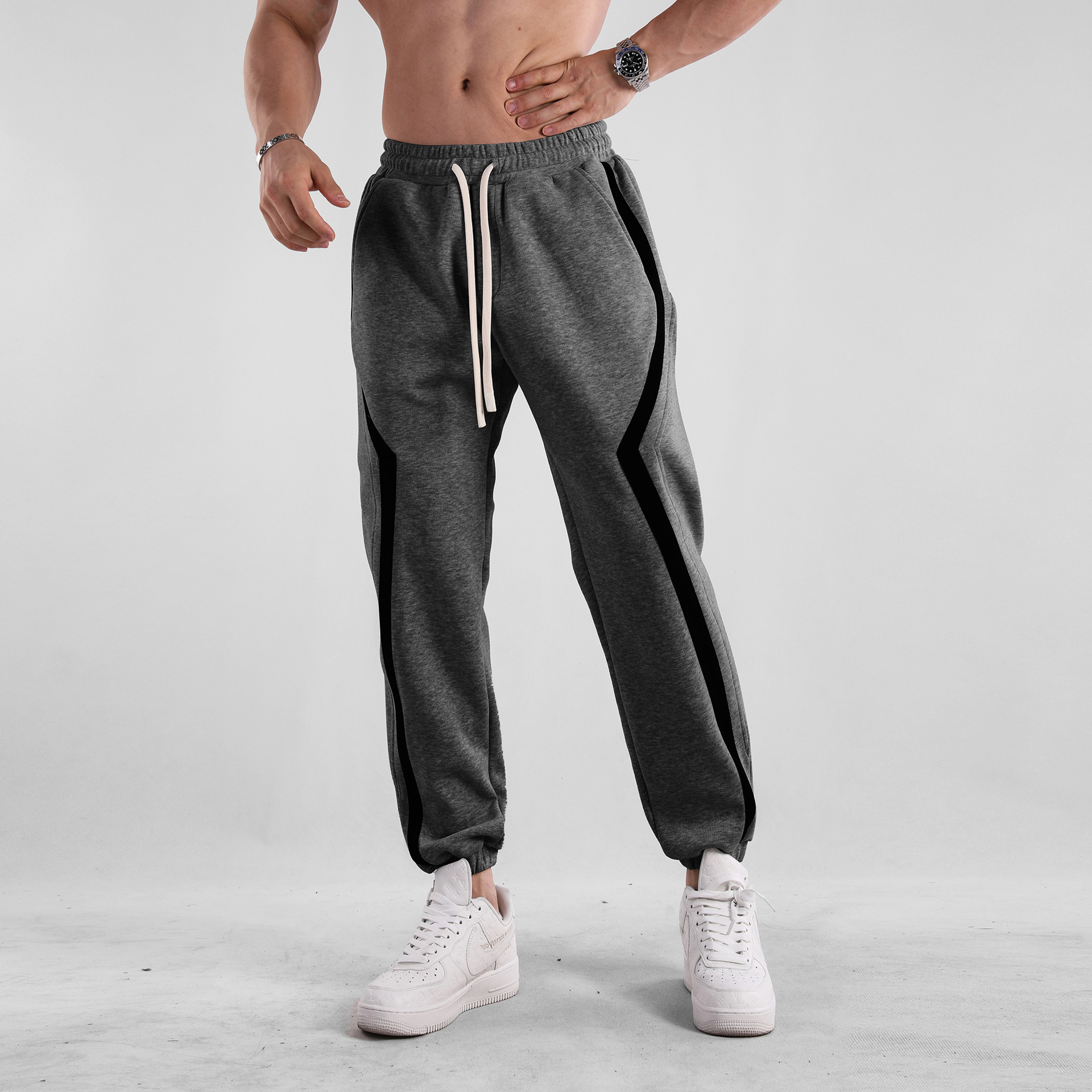 Otoño e Invierno a rayas americano casual deportes europeo y americano más tamaño pantalones sueltos pantalones de chándal muscle hombres deportes nueva moda