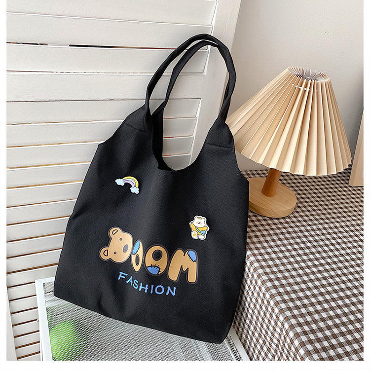 2021 Summer Japanese-style simple canvas bag, student backpack, single-shoulder handbag for going out, cartoon badge cotton bag undefined