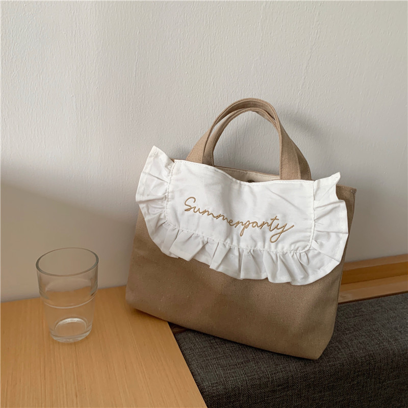 1441 Japanese and Korean chic Sweet ruffled bento Bag, Fresh embroidered hand-held small cloth bag, girl student bag wholesale undefined