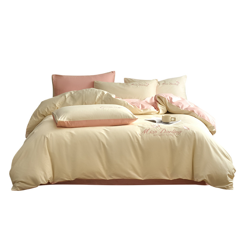 Estilo de lujo ligero 40 piezas de algodón puro traje de cuatro piezas corazón de niña bordado floral funda de edredón ropa de cama de algodón suave de alta calidad