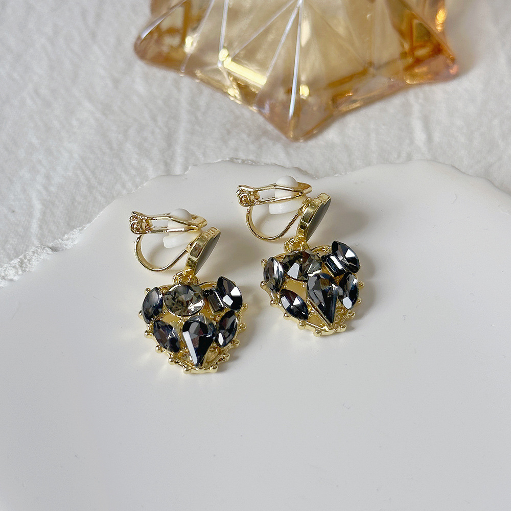 Versión coreana del temperamento de camelia, sin orejas perforadas, pinza para la oreja, flor de perla, tablero de ajedrez, pinza para la oreja triangular con diamantes, pendientes de nicho para mujeres