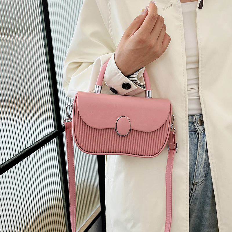 Versión coreana del bolso de nicho 2025 verano nuevo bolso femenino de alta calidad textura bolso de hombro moda bolso de mensajero a rayas marea