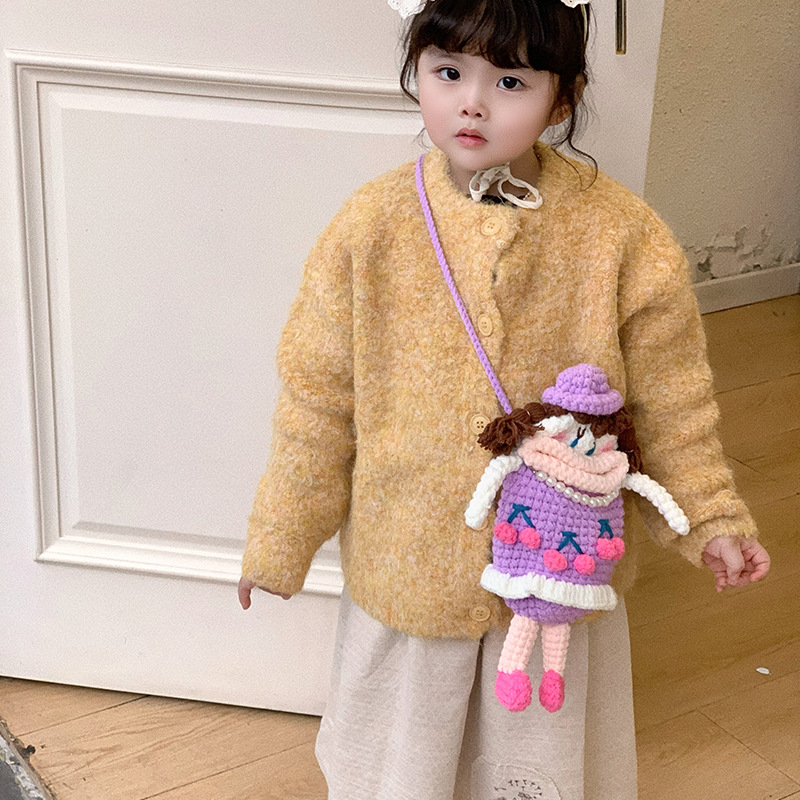 Hombres y niños de dibujos animados bolsos de hombro ganchos de lana productos terminados bolsos de mochila para niños adorables muñecas de boca grande bolsos de cambio para niños