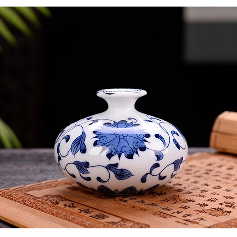 Flores de porcelana azul, vasos de flores de cerámica de lujo ligero, flores de alto nivel, decoración de mesa de comedor de estilo nuevo chino