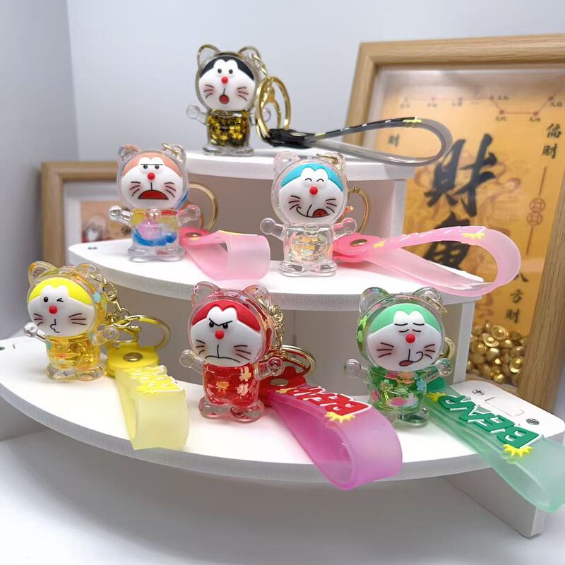 New Doraemon Blue Chubby Keychain Cute Doraemon Cat Liquid Sand Bottle Bag Pendant Couple Car Keychain