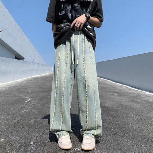 Yellowish-brown wool denim jeans for men, featuring a high-street vibe and an American-style trendy brand design—summer edition, effortlessly cool, with a relaxed, loose fit and straight, wide-leg silhouette.