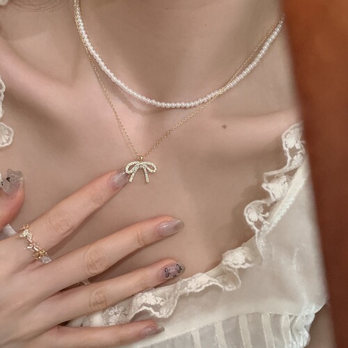S925 silver plated 14K gold bow pendant necklace zircon light luxury niche design clavicle chain temperament necklace