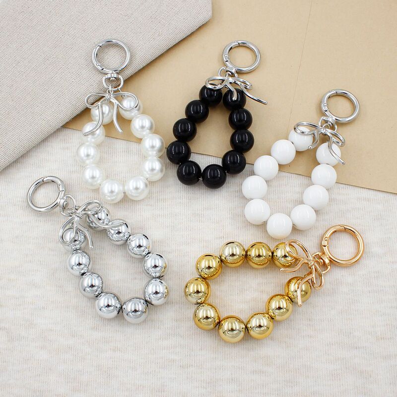 ins-style luxury bowknot beaded keychain, Korean version faux pearl bag pendant, mobile phone chain, wholesale supply ins-style luxury bowknot beaded keychain, Korean version faux pearl bag pendant, mobile phone chain, wholesale supply