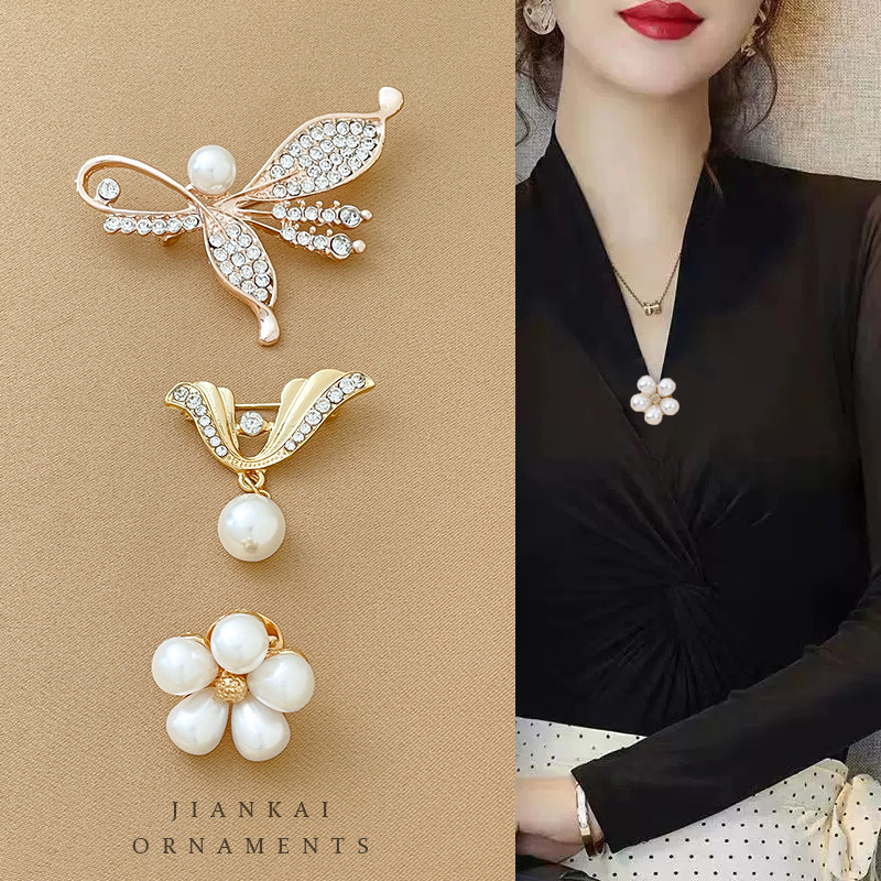 Arco de mariposa artefacto de alta gama sin costura broche pequeño temperamento femenino universal pin de ropa fija de traje collar