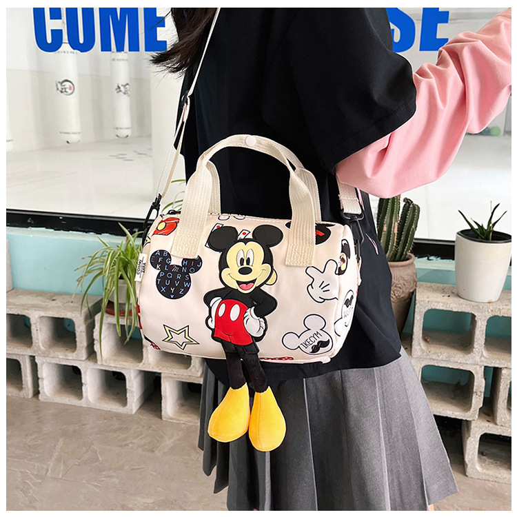 In 2024, the best-selling children's bags will feature cute Mickey Mouse-patterned bowling bags for girls, casual hand-held shoulder bags, and a unique style undefined