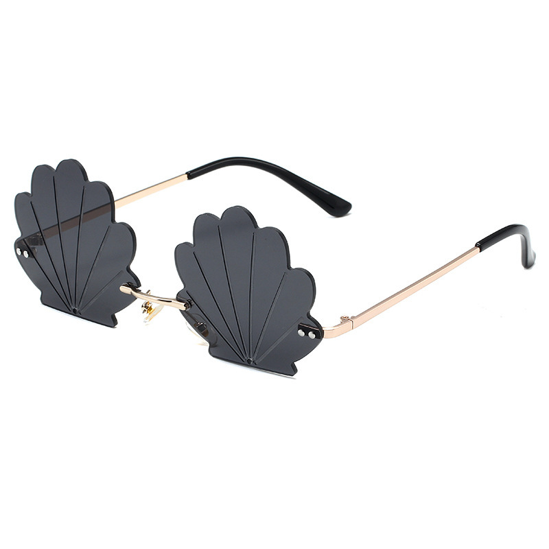 New flower frameless sunglasses European and American personality shell sunglasses cross-border catwalk street shooting sunglasses tide New flower frameless sunglasses European and American personality shell sunglasses cross-border catwalk street shooting sunglasses tide