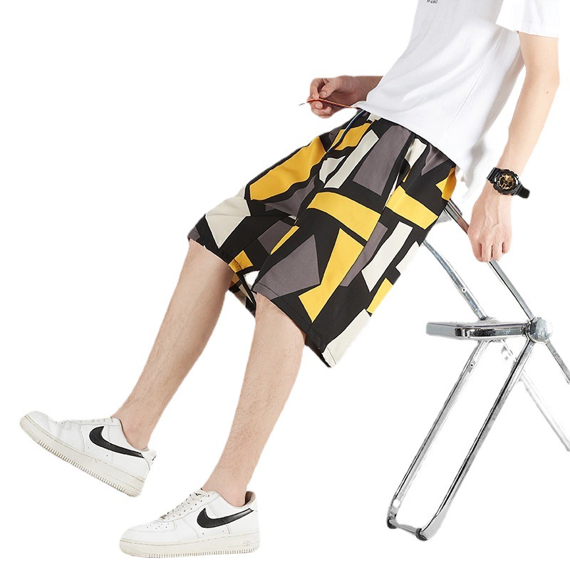 Pantalones de playa de verano, pantalones cortos sueltos para hombres, pantalones grandes de moda, pantalones casuales de hip-hop ligeros, pantalones de cinco puntos de secado rápido