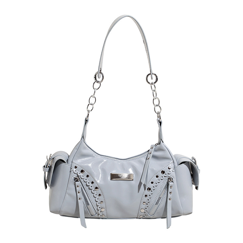 Bolso de axila de textura de alta calidad 2025 verano nuevo bolso femenino personalizado bolso de remache retro bolso de hombro de gran capacidad