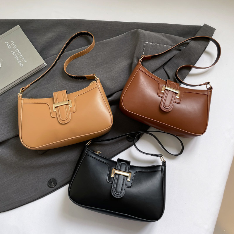 Bolso de brazo retro de alta calidad para mujeres 2025, nuevo bolso de mujer, bolso de hombro de moda, simple bolso de estilo exterior.