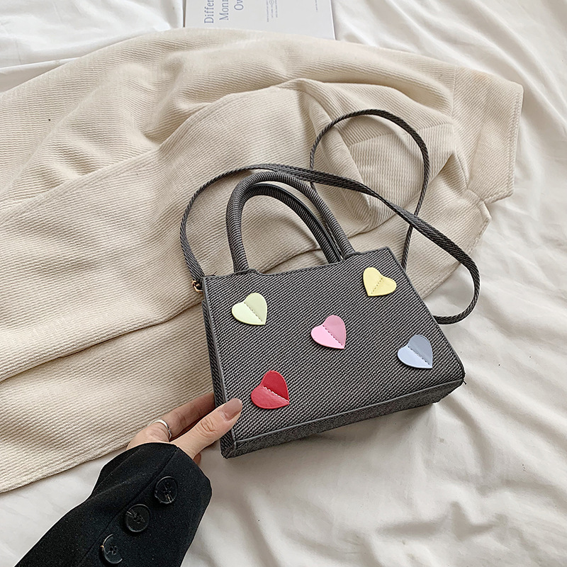 Este año, la popular explosión de bolsos para mujeres 2024 nueva moda versátil bolsos de mochila súper caliente bolsos portátiles de trabajo