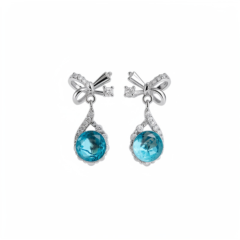 Aguja de plata zircon arco gotas de agua simple temperamento moda aretes de aretes ligeros de lujo alta sensación de aretes al por mayor