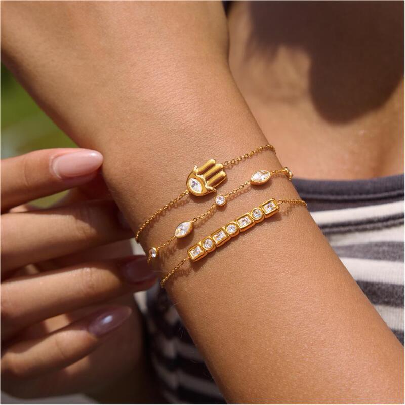 Wanxing 18K Gold Plated Stainless Steel Zircon Fatima's Hand Stackable Bracelet Women's Designer Set Wholesale Wanxing 18K Gold Plated Stainless Steel Zircon Fatima's Hand Stackable Bracelet Women's Designer Set Wholesale