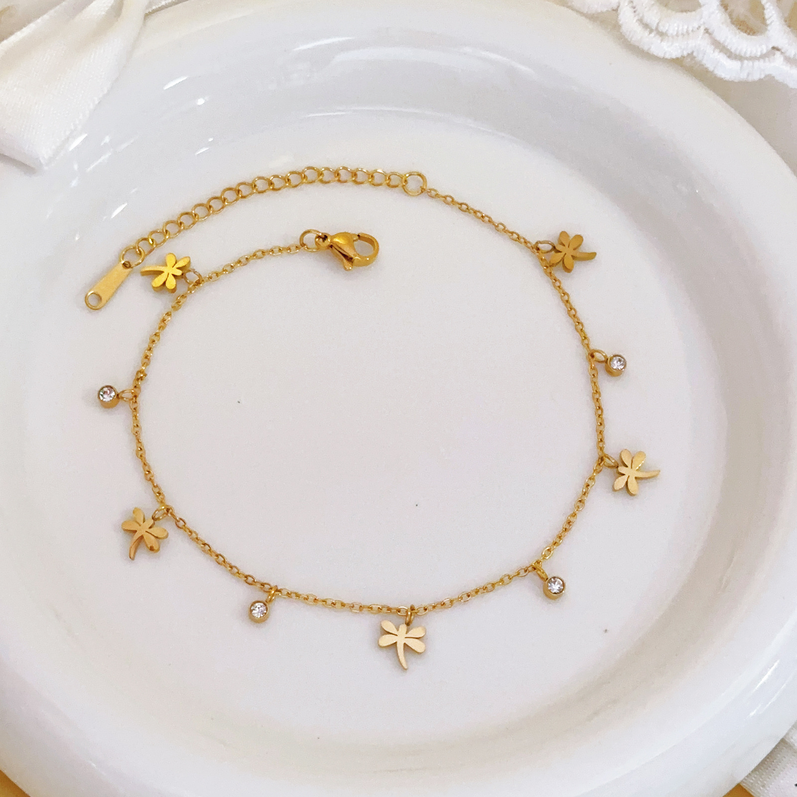 Amazon venta caliente libélula tobillera mujer 18k oro pequeña margarita joyería fresca y dulce cadena de pies sexy ins