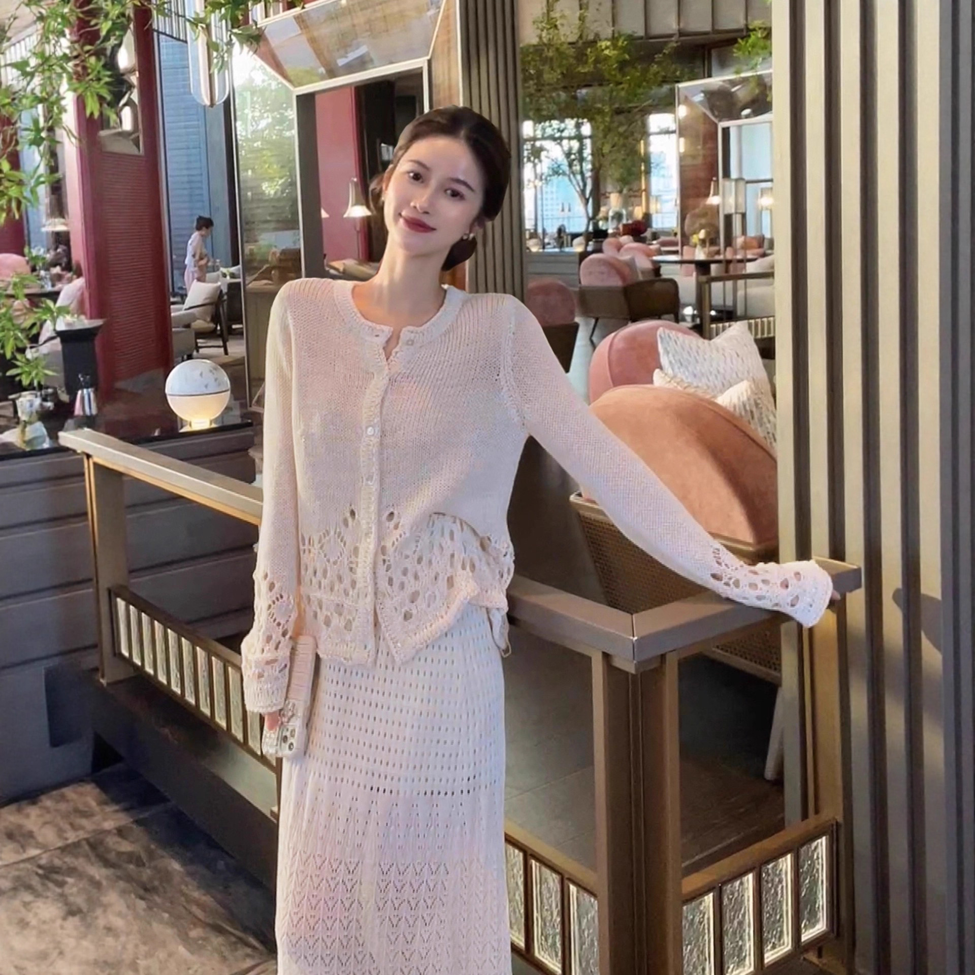 Elegant and stylish off-white woven openwork long-sleeved long skirt set, a new autumn 2025 style.
