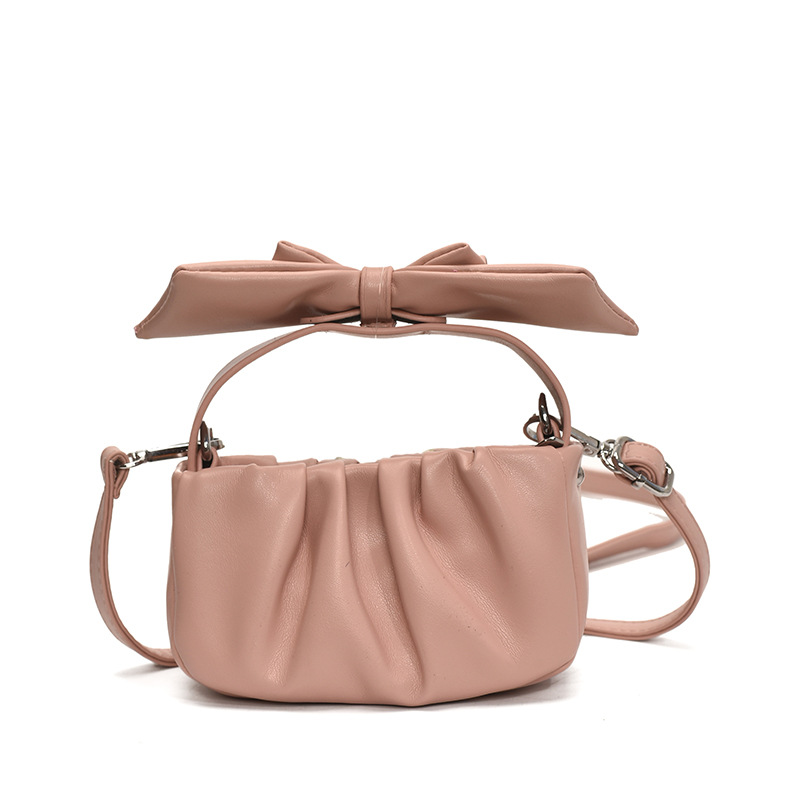 Versión coreana del bolso de nube de niña de color sólido simple estilo occidental pliegue lindo lazo bolso de bebé nuevo bolso para niños