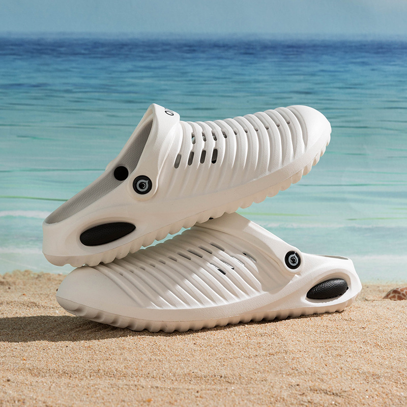 2025 verano nuevo estilo para hombres ropa al aire libre antideslizante fondo suave desodorante Baotou agujero sandalias sandalias de playa para hombres