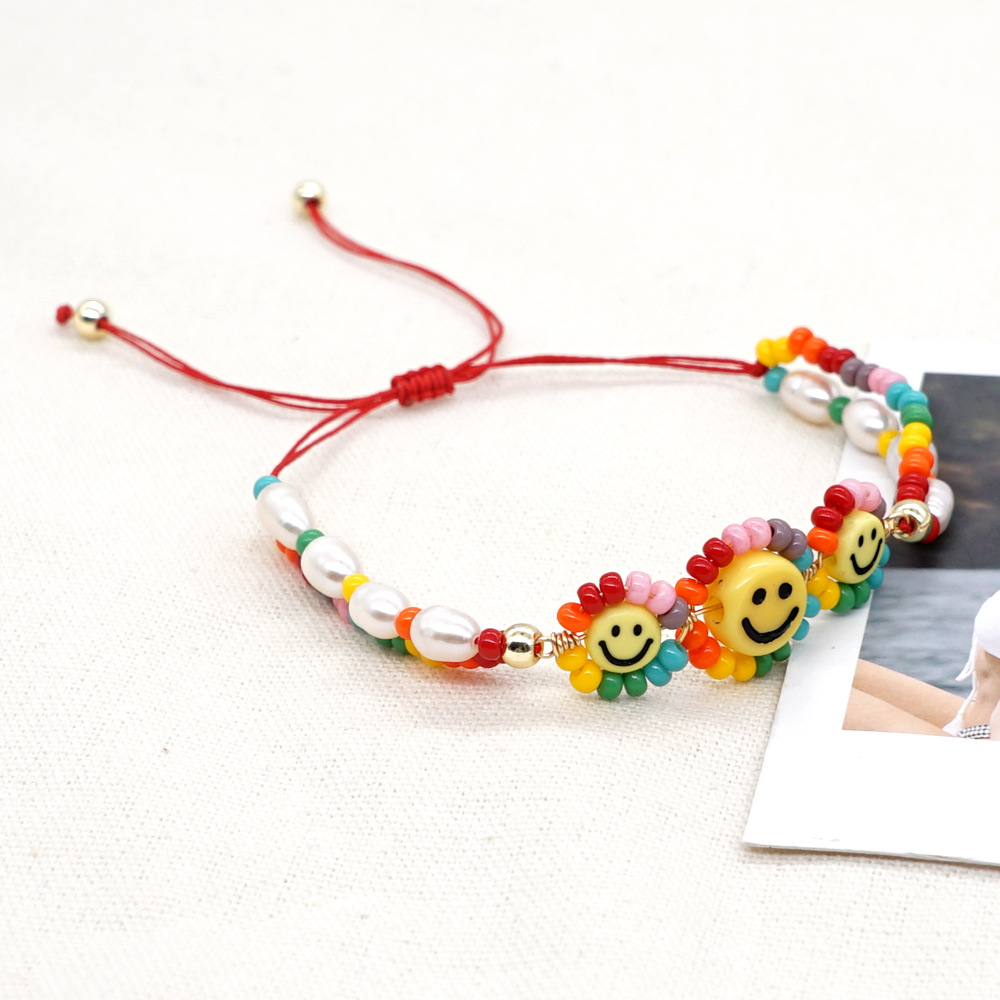 Bohemian Three Smiling Face Sun Flower Baroque Freshwater Pearl Bracelet display picture 3