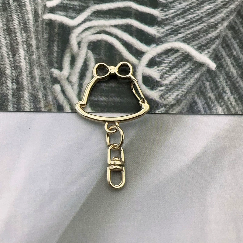 Small bell, rotating keychain, metal accessory with accessories handmade
