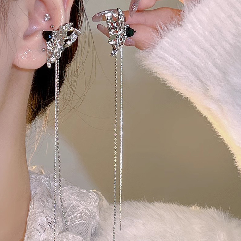 Diseño de nicho de alta gama borla larga sin orejas clip de oreja elegante estilo occidental de las mujeres cara-mirando pequeños nuevos pendientes de moda