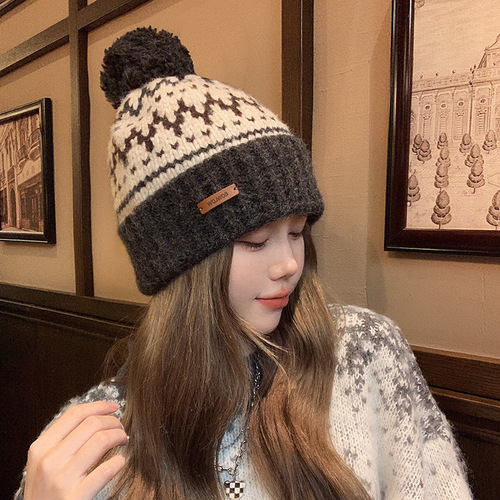 2024 new jacquard wool hat for women in autumn and winter ear protection, warm cold hat, cute hair ball knitted hat, big head circumference