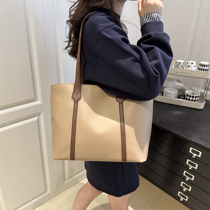 Bolso coreano de gran capacidad de alta calidad para mujeres 2025 nueva moda retro bolso de viaje tote simple bolso de hombro de color sólido