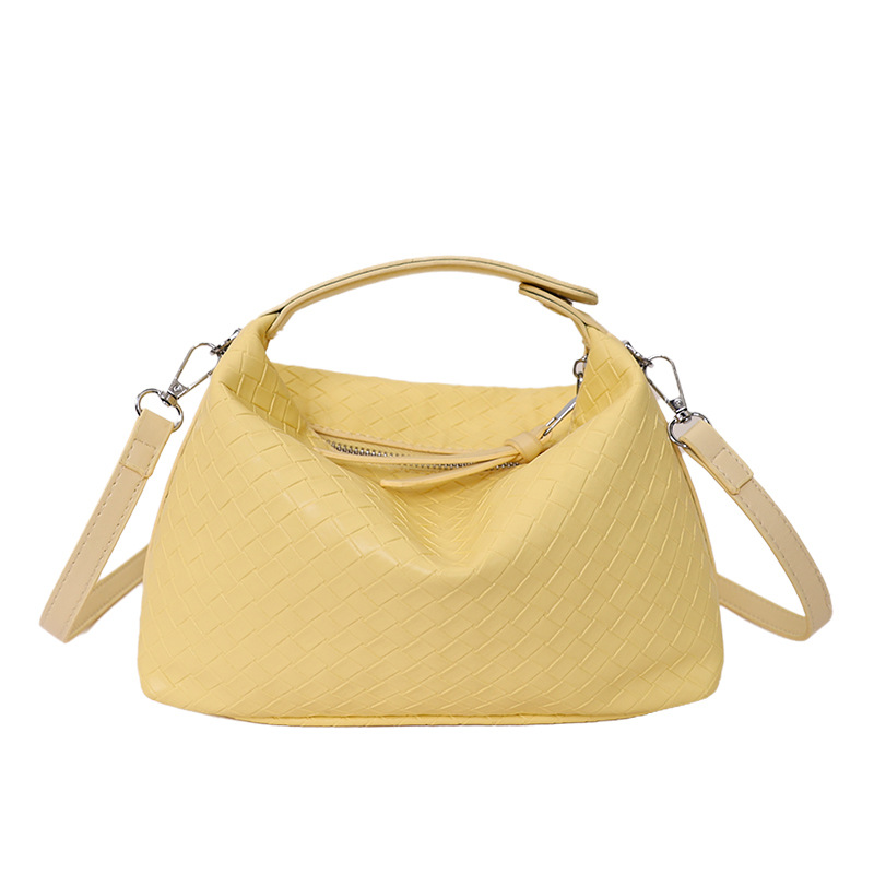 Nicho trenzado bolso de cubo para mujeres 2026 verano nuevo bolso de hombro portátil bolso de gran capacidad diaria