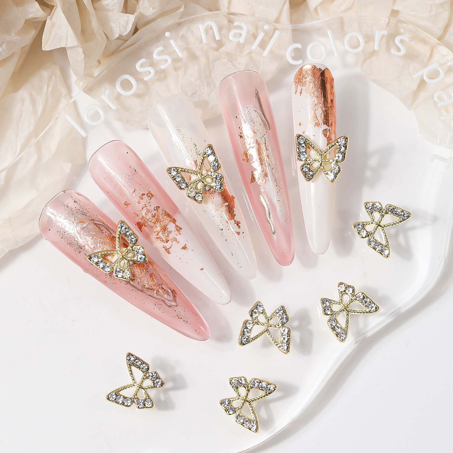 Venta caliente transfronteriza mariposa joyería de uñas aleación hueca alas de diamantes estrella de cinco puntas accesorios de decoración de uñas al por mayor