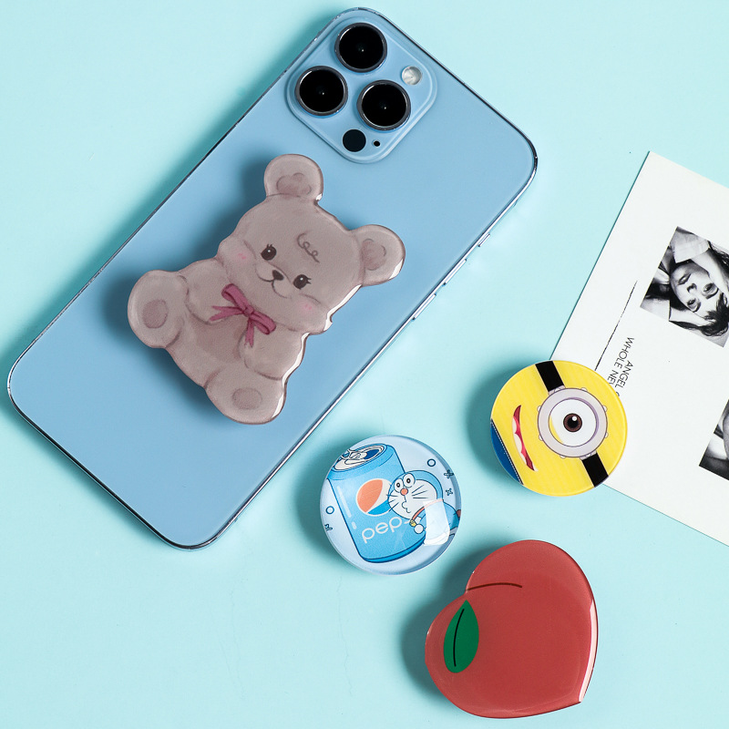 Soporte de airbag acrílico de forma alienígena al por mayor encantador alrededor de las estrellas de dibujos animados soporte de teléfono móvil en stock DIY