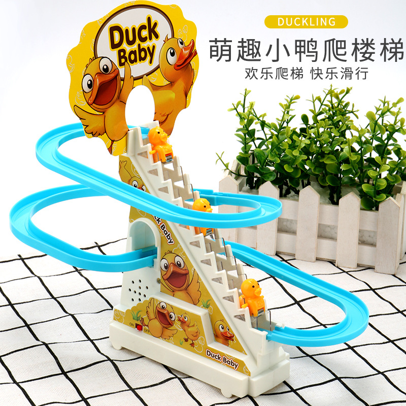 El mismo pato escalera pista de rompecabezas pequeño pato deslizante diapositivas música luces juguetes para niños al por mayor