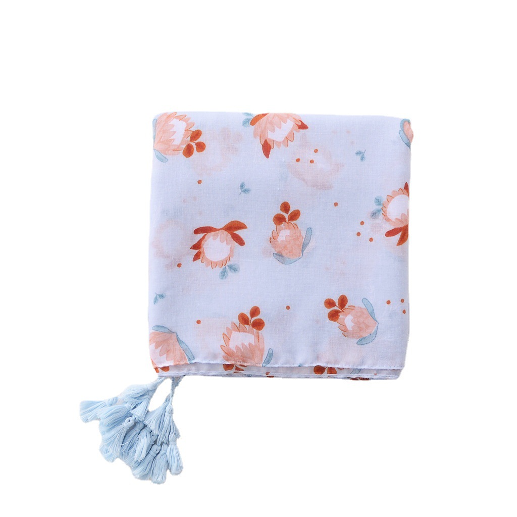 2022 primavera y verano nueva pequeña bufanda de seda fresca larga borla chal azul claro flor impresa bufanda de algodón y lino para mujeres