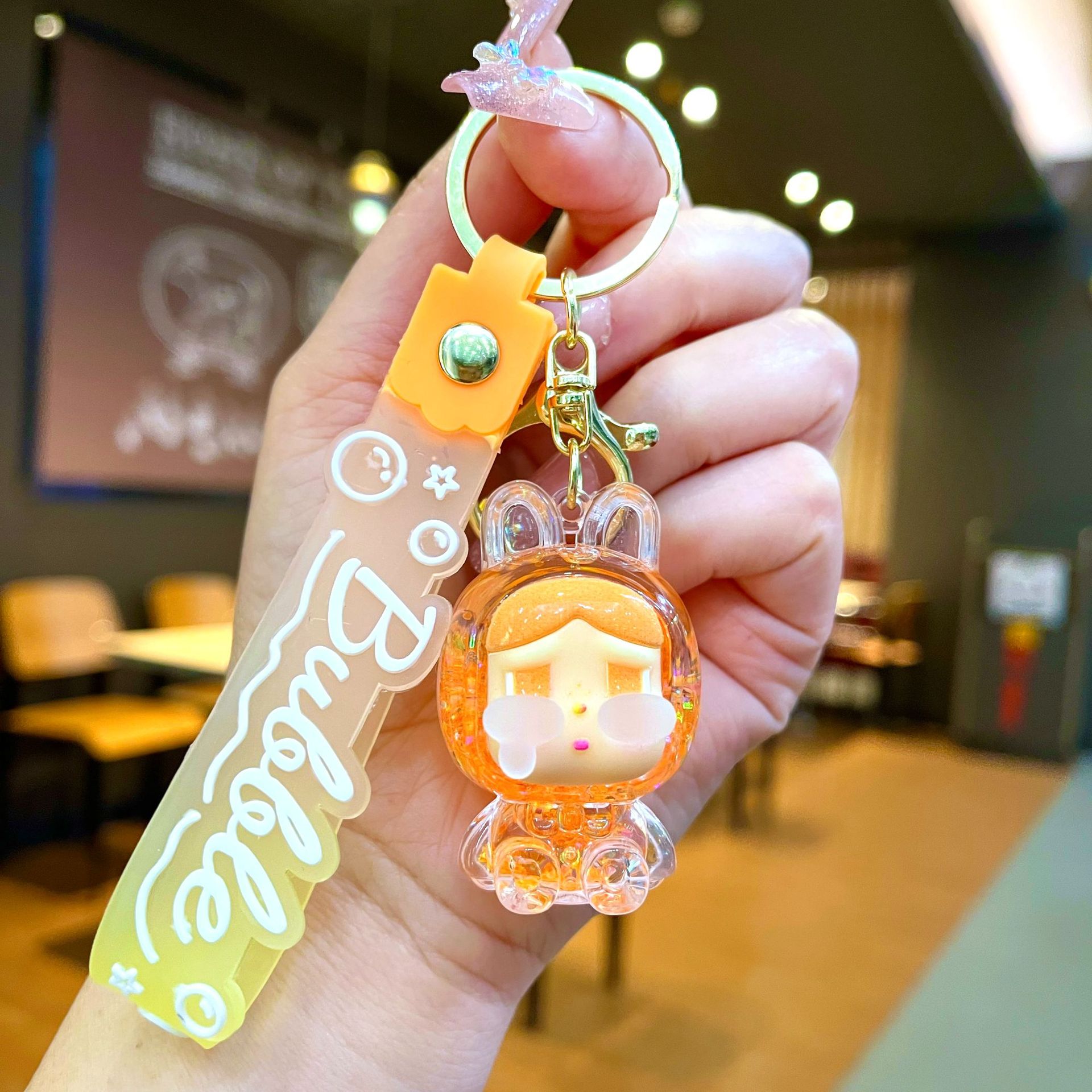 Llavero red acrílico con arena flotante