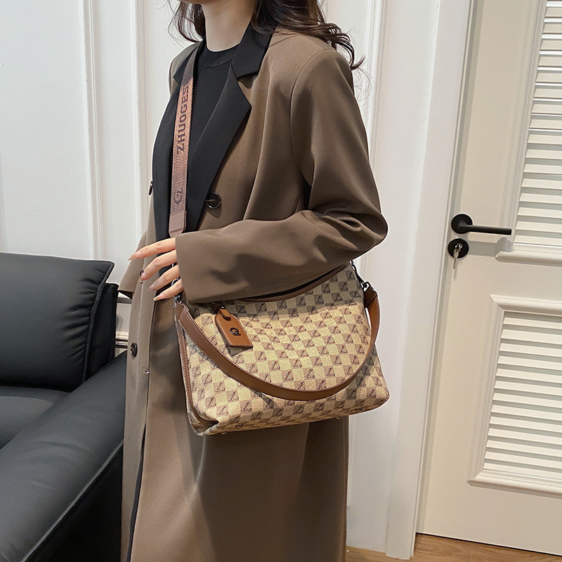 Bolso de moda transfronterizo para mujeres 2024 nuevo diseño de nicho bolso de hombro clásico bolso de mensajero del todo fósforo