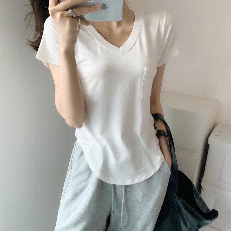 2026 verano nueva camiseta de algodón de alta calidad de manga corta cuello en V suelto delgado universal de moda irregular camiseta de mujer