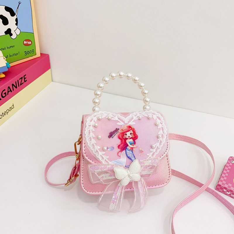 La niña transfronteriza Aisha bolso de hombro de este año, bolso de perla de moda popular, bolso de hombro para niños coreanos.