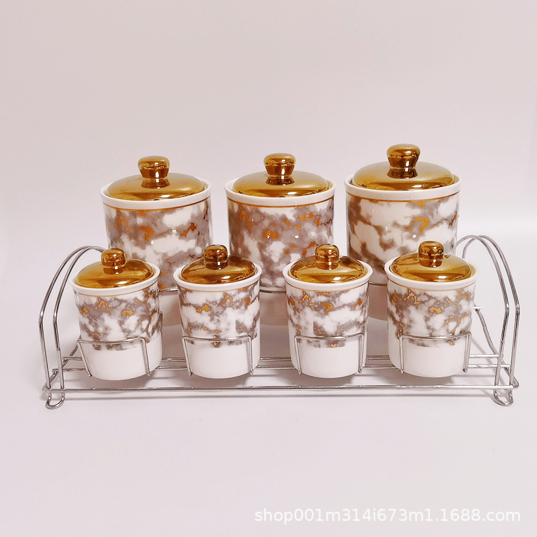 Exportar a Oriente Medio Arabia Saudita cerámica galvanoplastia cilíndrica condimento tarro almacenamiento café tarro con marco de hierro de doble capa