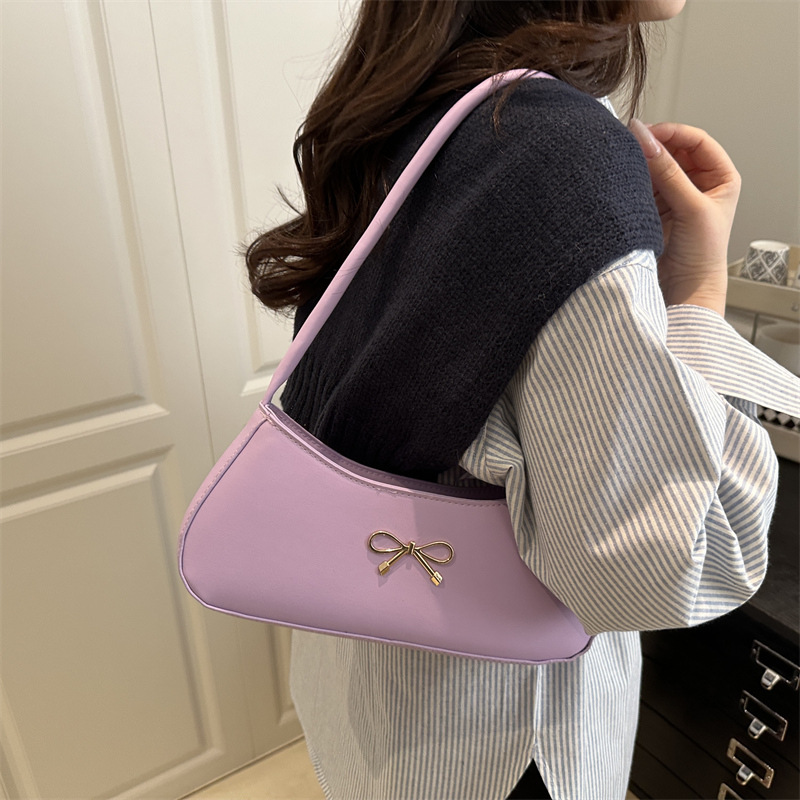 Bolso de axila con lazo para mujer 2025 nuevo bolso de bola de masa de lujo simple y ligero de alta calidad textura bolso de mensajero de un solo hombro marea