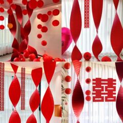 結婚部屋に赤い本を配置して、中国式の結婚部屋の寝室のお祝いの折り紙を飾って、花を引いて提灯を飾っています。