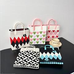新品大容量ニットバッグ高级感ins携帯バッグ小众シングルショルダーバッグ漫画ファッションハンドバッグ