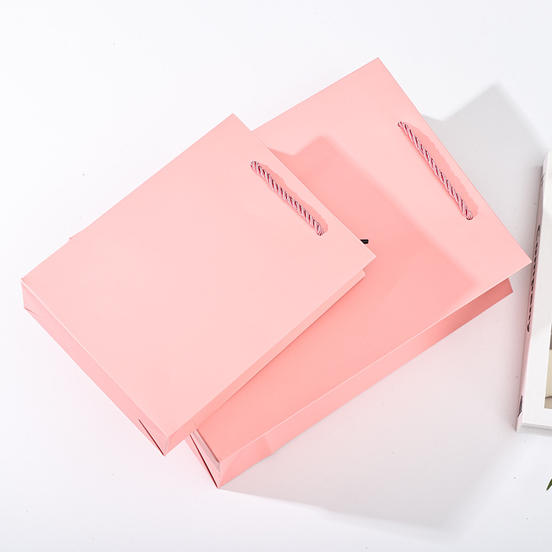 Bolsa de papel de cartón blanco engrosada y respetuosa con el medio ambiente portátil, pastel de luna de té, bolsa de embalaje de regalo de alta gama, bolsa de regalo de ropa, venta al por mayor transfronteriza