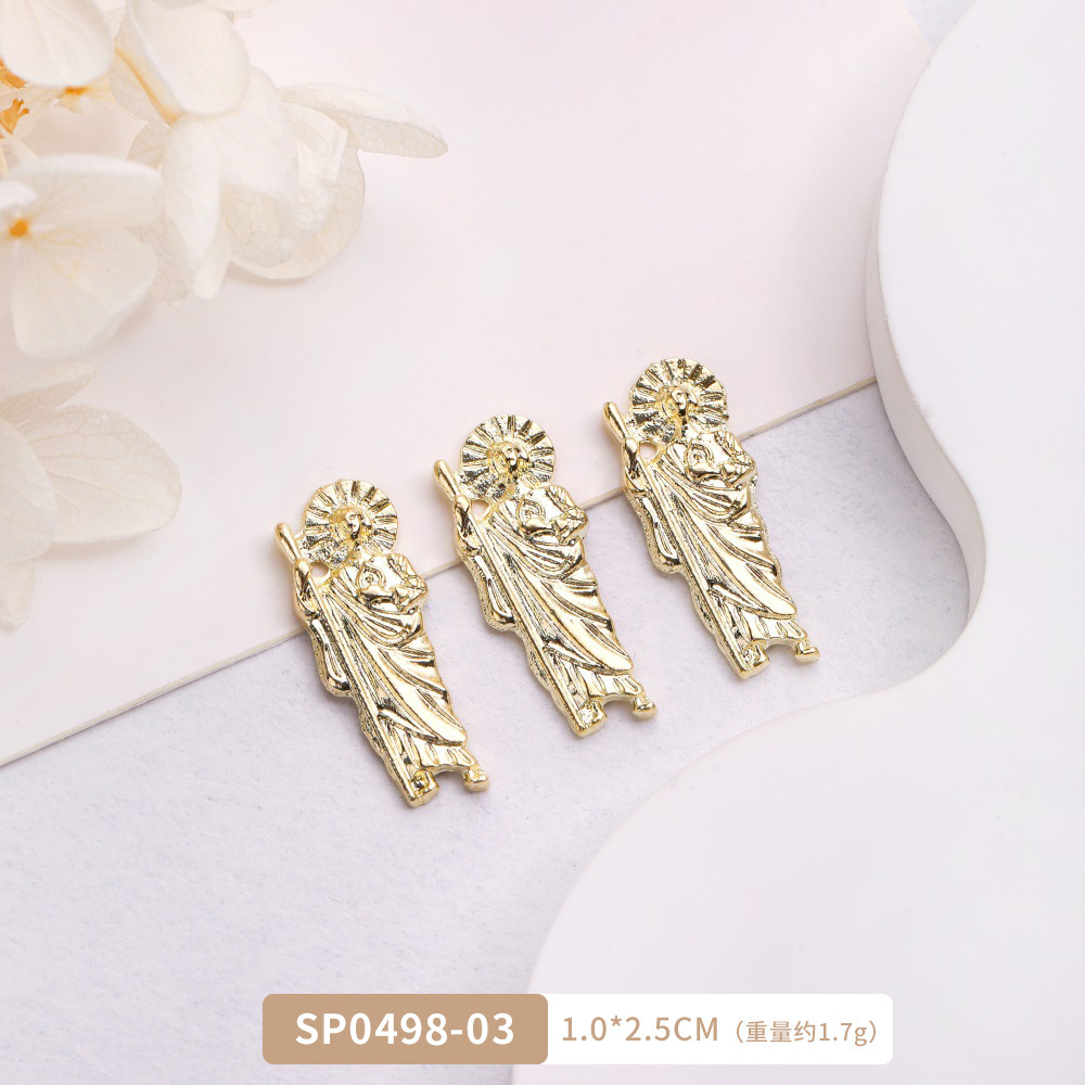 Arte de uñas transfronterizo Jesús accesorios de metal DIY vintage metal aleación uñas arte joyería europea y americana Luz de lujo accesorios con diamante