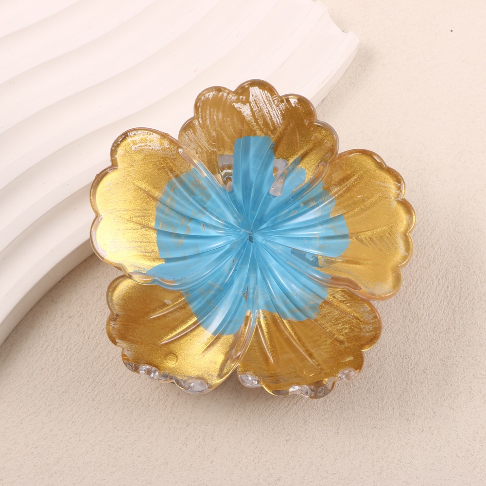 Shell flower—blue heart on gold background