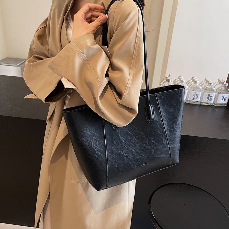 Bolsa de mano transfronteriza de gran capacidad para mujeres 2025 nueva bolsa de brazo portátil de viaje de alta calidad bolso de hombro casual
