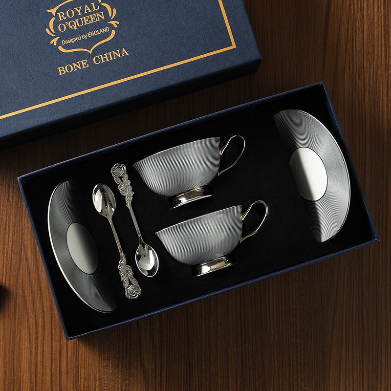 Tazas y platillos de café de porcelana china de alta gama, lujo ligero, té de la tarde de alto valor, tazas de pareja, cajas de regalo exquisitas, tazas de cerámica de lujo