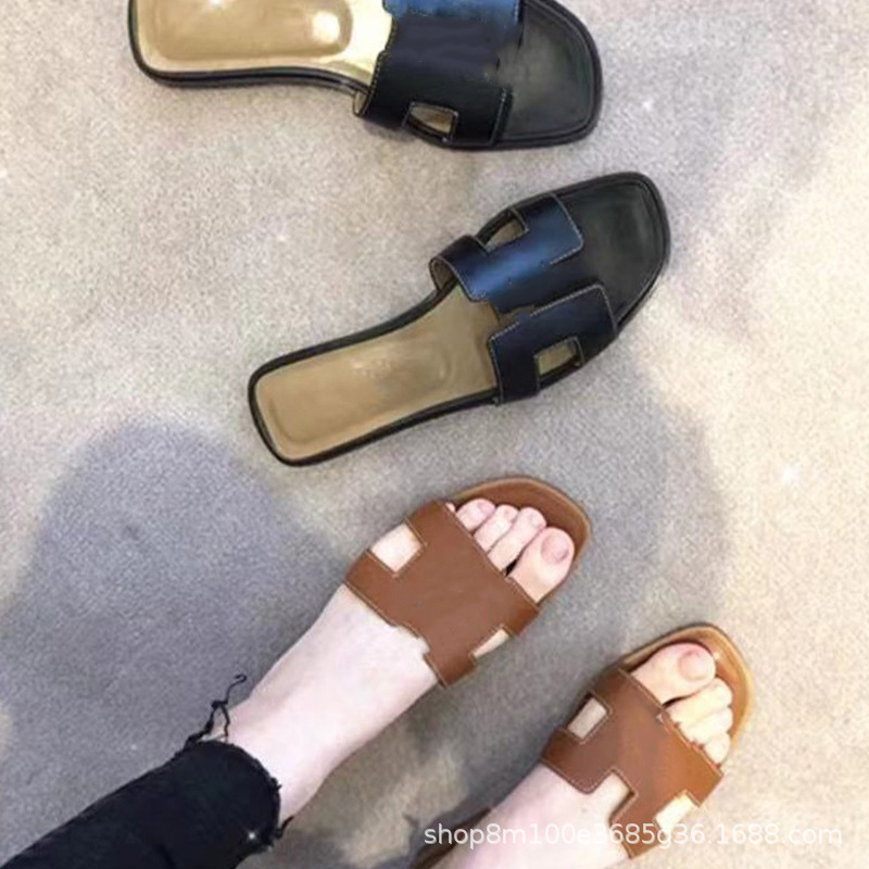 鼎羊皮の新型真皮平底ネット赤同タイプのスリッパ女性夏外着一字引きビーチカジュアル太さと涼しさ引き
