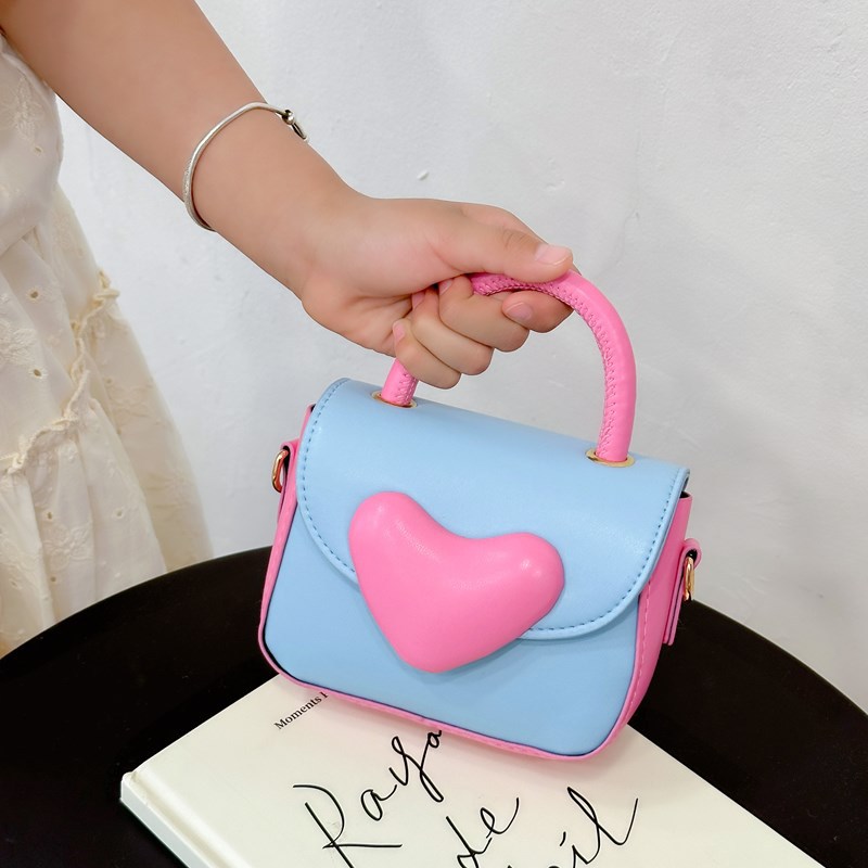 Bolsos para chicas coreanas de dibujos animados de amor contra colores de moda extranjera para niños de un solo hombro bolso de cambio